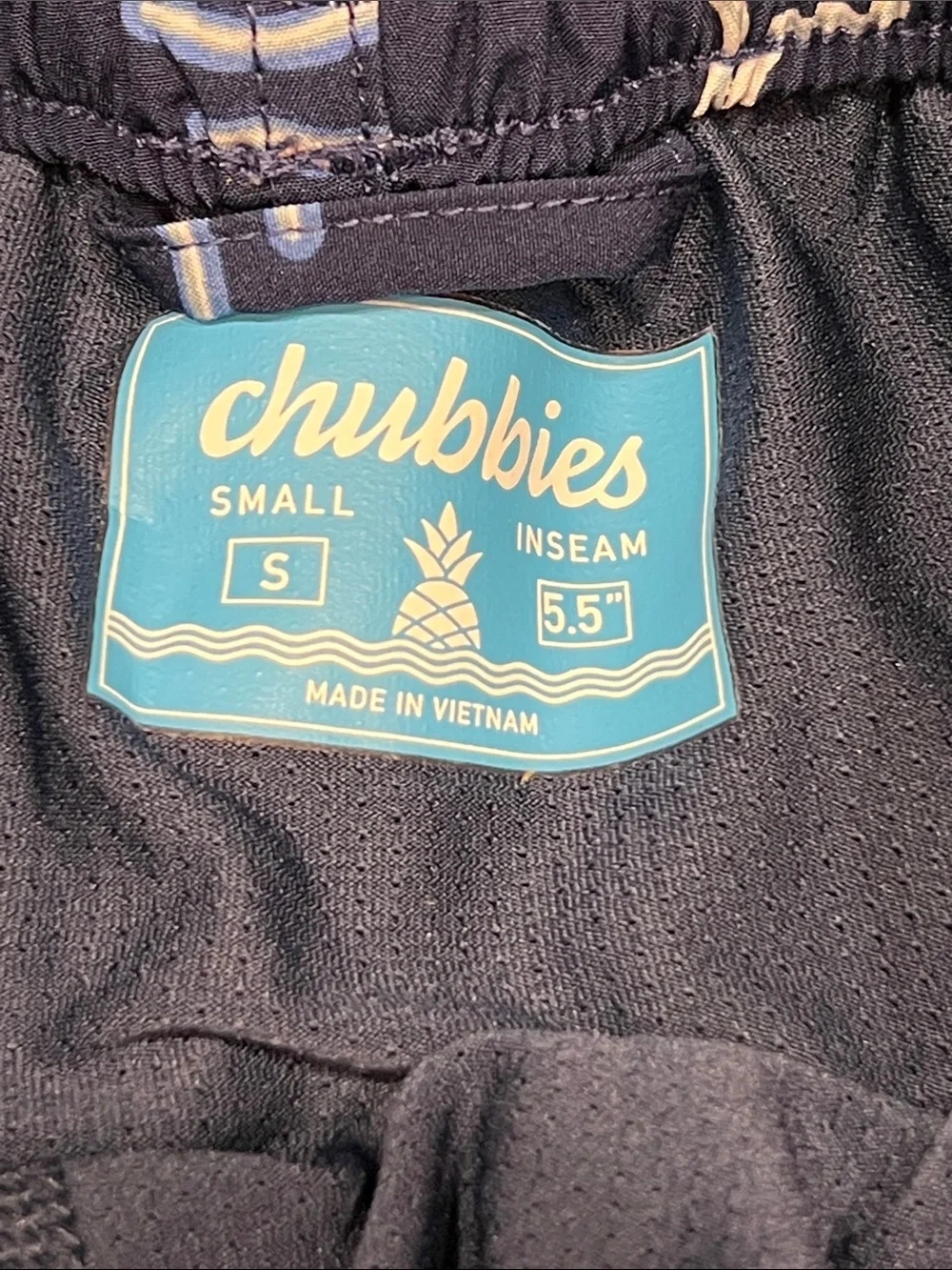 chubbies Navy Tropical Neon Print Swim Trunks